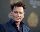 Телохранители Джонни Деппа подали на него в суд